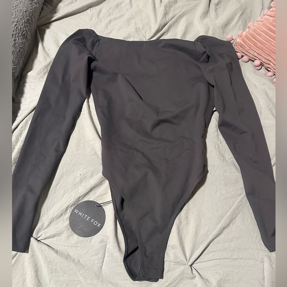 White fox bodysuit never worn